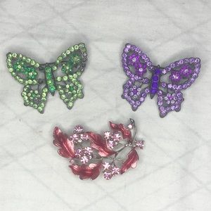 Three Brooches